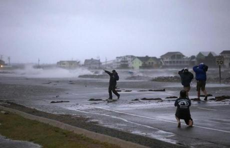 A television reporter on the scene in Nags Head. 
